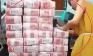 女子称从银行取的5万中有3万是假