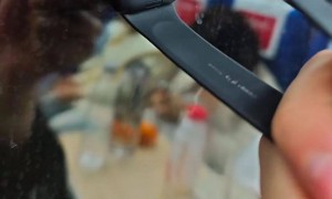 玻璃上贴智能手表成当代吞灯泡